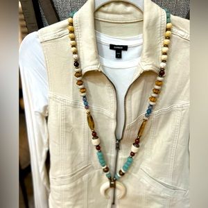 Statement necklace with a rustic flair, fashionable and trendy .